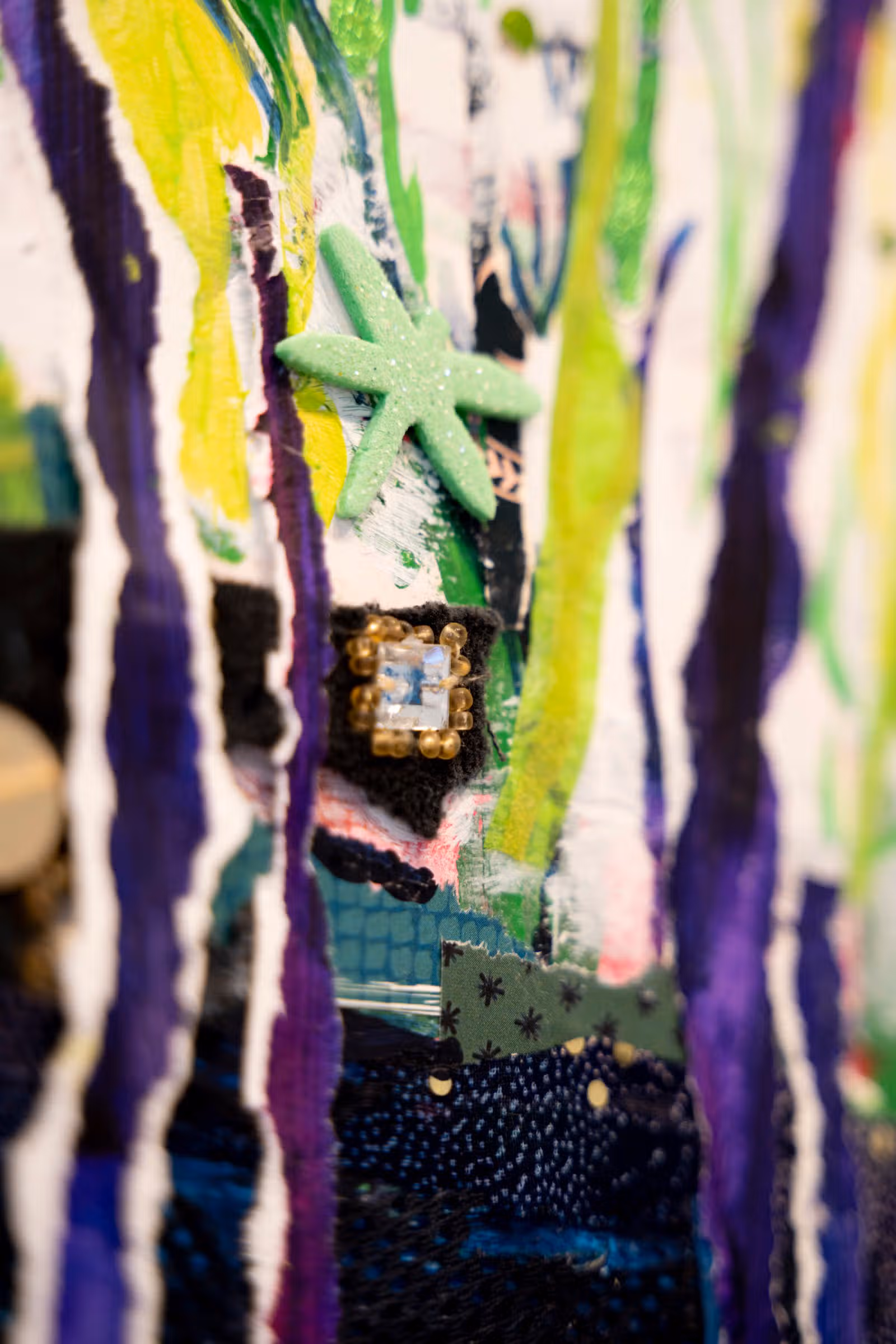 Detail — groen spielgeltje